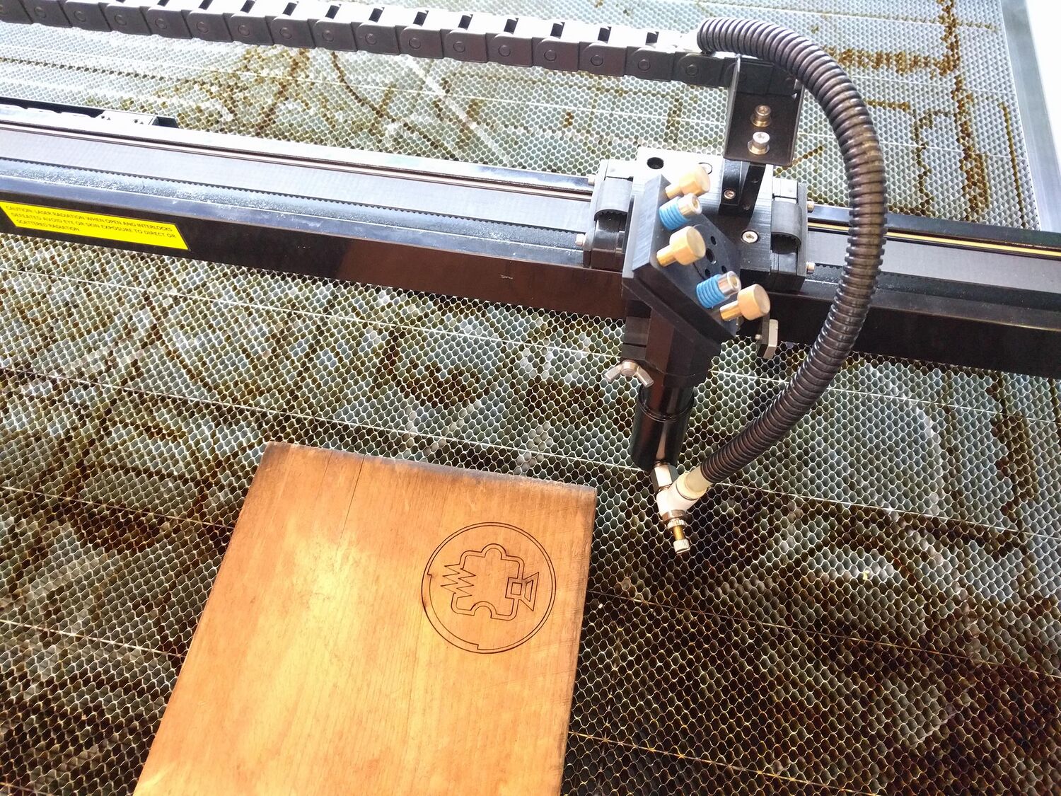 laser cut Noisebridge logo