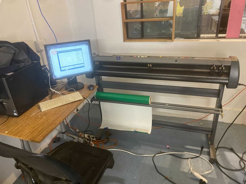 The vinyl cutter station in all its glory.