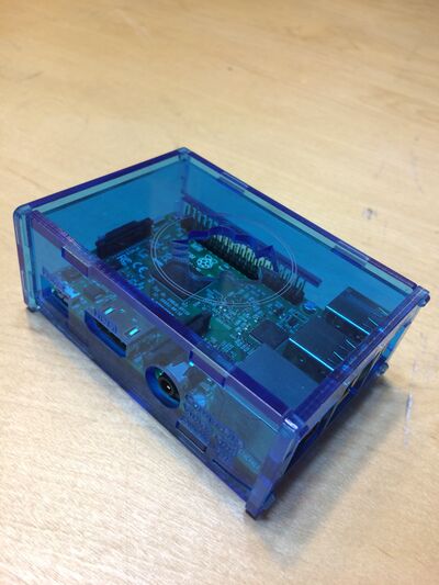 a plexiglass case for a raspberry pi computer